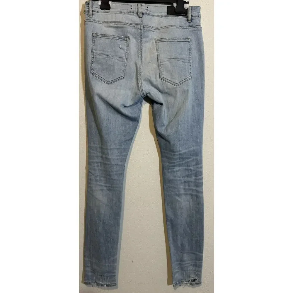 EUC Amiri Distressed Denim Skinny Jeans